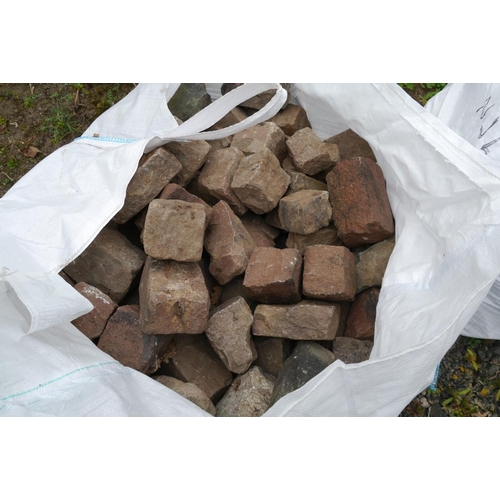 232 - A bag of granite sets -1 approx 150 each