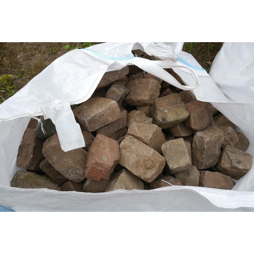 233 - A bag of granite sets -1 approx 150 each