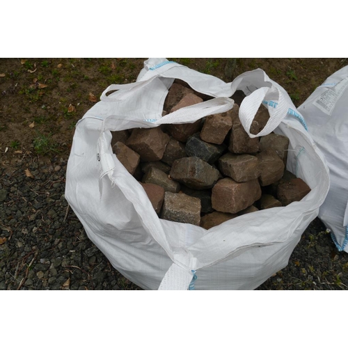 235 - A bag of granite sets -1 approx 150 each