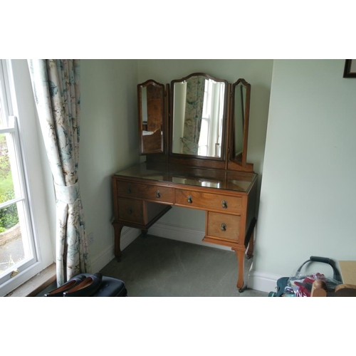 331 - A walnut veneer bedroom suite of 3 door wardrobe, dressing table with triple mirror, chest of drawer... 