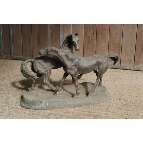 345 - A metal figure of 2 horses 26