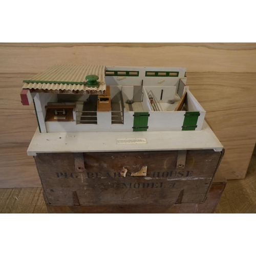 21 - Scale model- Pig rearing house,  and original storage box