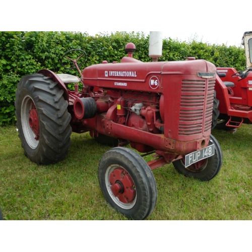 117 - International W6 standard tractor. Early restoration, wheel weights, pulley. Runs. Reg. FUP148. V5. ... 