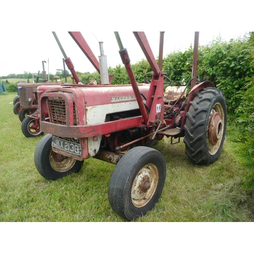 126 - McCormick 434 tractor with loader, roll bar, rear wheel weights. Runs. SN.B22970. Reg. JKX 213G.+VAT