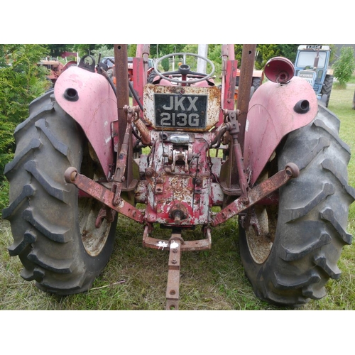 126 - McCormick 434 tractor with loader, roll bar, rear wheel weights. Runs. SN.B22970. Reg. JKX 213G.+VAT