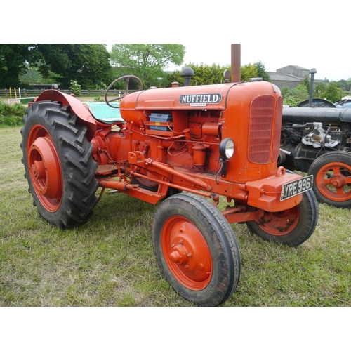 162 - Nuffield Universal M4 tractor with loader brackets, rear wheel weights, front weight, good tyres. Ru... 