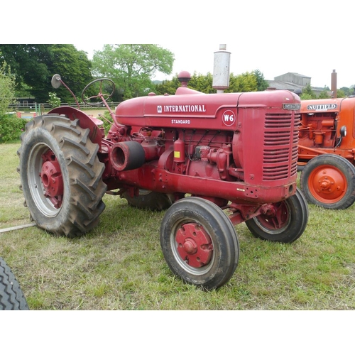 163 - International W6 standard tractor. Early restoration, pulley. Runs +VAT