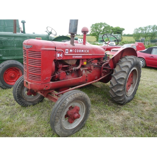 165 - McCormick International W4 tractor. Early restoration, pulley. Runs SN. 4406+VAT