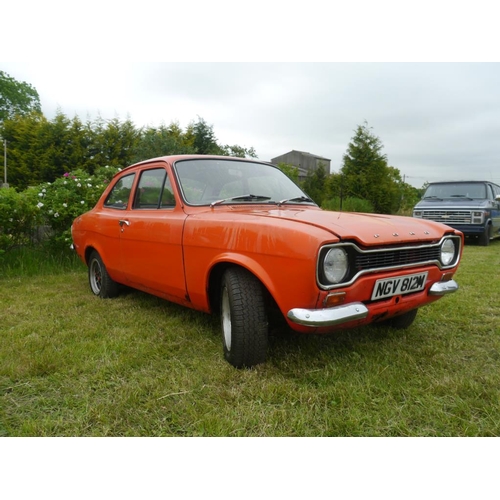 221 - Ford Escort 1300GT Sports. 1973. 70,555miles. C/w old photos, owners manual and MOT papers. With key... 