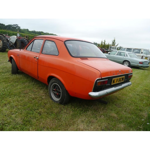 221 - Ford Escort 1300GT Sports. 1973. 70,555miles. C/w old photos, owners manual and MOT papers. With key... 