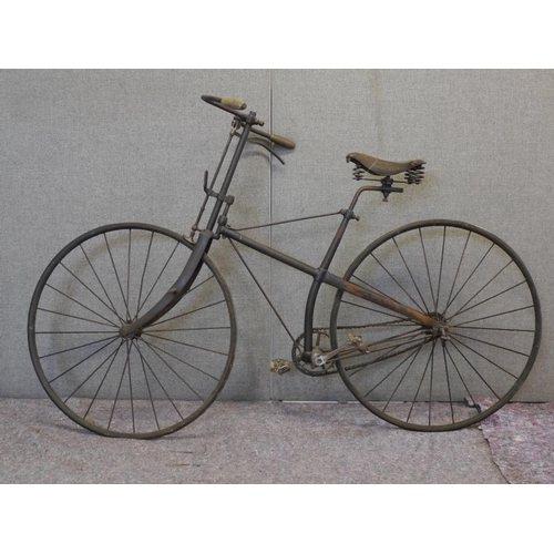 414 - Juvenile Cross frame safety bicycle. 1886. Solid tyres 25