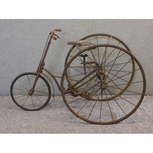 419 - Early Juvenile tricycle. George Townend, Coventry. 1886. On hollow rimmed wheels, link chain, and ce... 