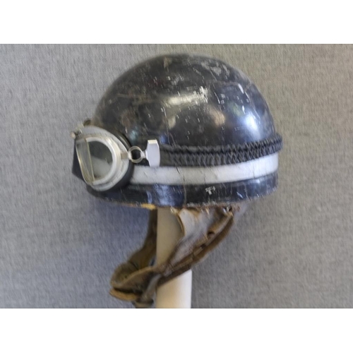 483 - Early black and silver race helmet and goggles