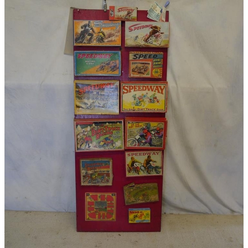 61 - Speedway board game boxes on wooden frame