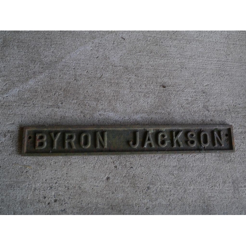 659 - Cast iron Jackson name plate