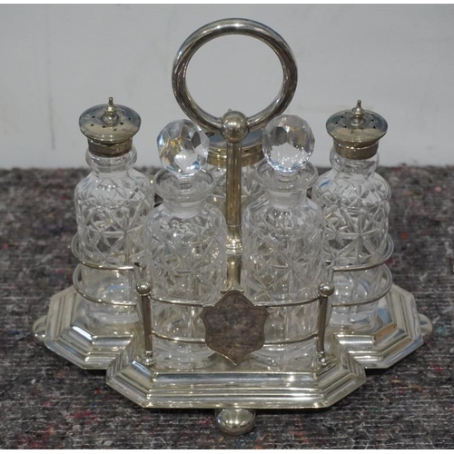 316 - Large silver plated condiment stand with 5 bottles