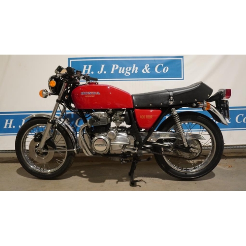 636 - Honda Super Sport 400 four motorcycle. 1976. 408cc. Very tidy bike, good chrome work. Reg. RAB 121P.... 