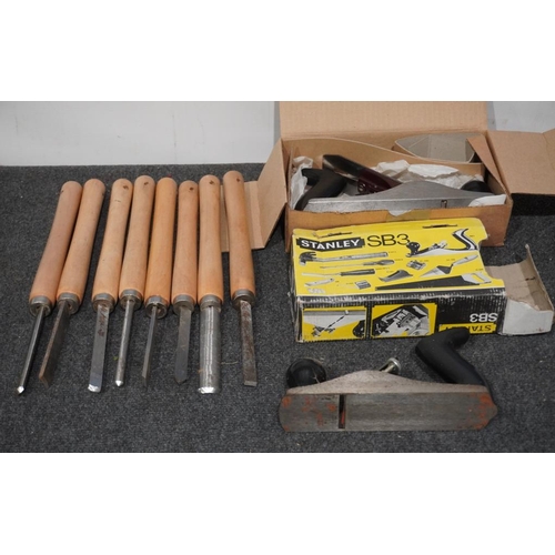 336 - Two Stanley bench planes, one unused and a quantity of turning chisels