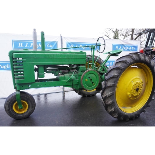 102 - John Deere Model B rowcrop tractor, early restoration. Reg. EG6 224 c/w old log book and buff log bo... 