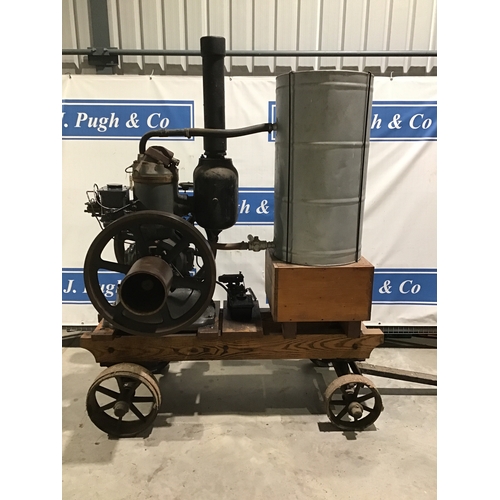 158 - Petter S type 10BHP hot bulb engine on trolley. With handle and blow torch.SN.213066 Suffered some d... 