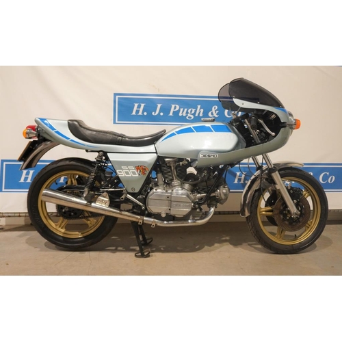 681 - Ducati SS900 Desmo motorcycle. 1979. 864cc. Immaculate condition in light blue with twin seat. Elect... 