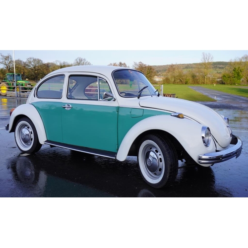 352 - Volkswagen Beetle saloon car. 1973. 1600cc 47,765 miles. Matching green paint and green leather inte... 