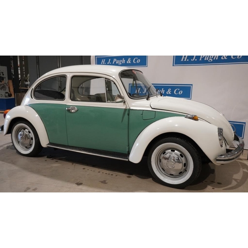 352 - Volkswagen Beetle saloon car. 1973. 1600cc 47,765 miles. Matching green paint and green leather inte... 