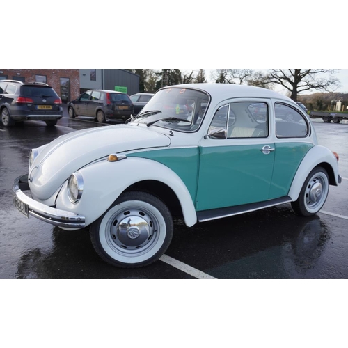 352 - Volkswagen Beetle saloon car. 1973. 1600cc 47,765 miles. Matching green paint and green leather inte... 