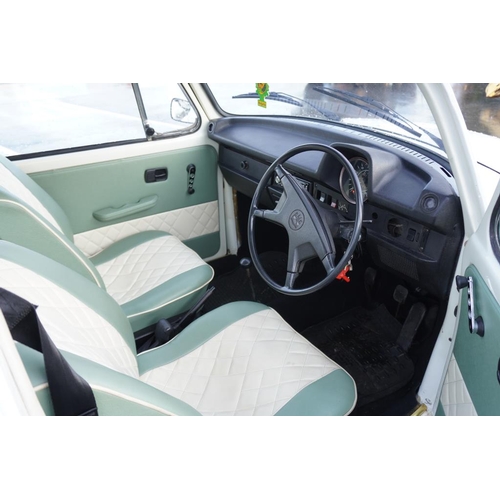 352 - Volkswagen Beetle saloon car. 1973. 1600cc 47,765 miles. Matching green paint and green leather inte... 