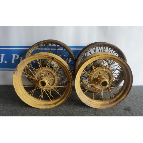 63 - 4 Assorted old car wheel rims