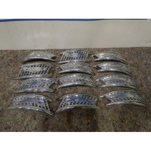 302 - Triumph tank badges. NOS x12