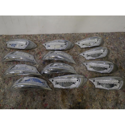 303 - Triumph tank badges. NOS x12