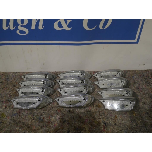 304 - Triumph tank badges. NOS x12