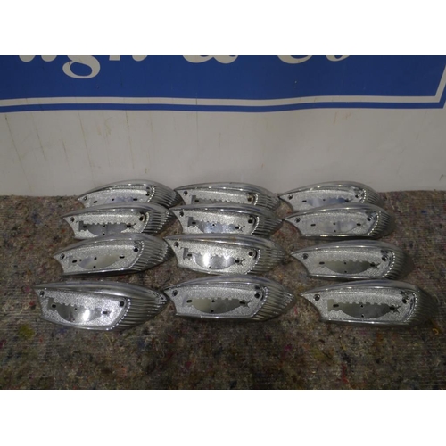 305 - Triumph tank badges. NOS x12