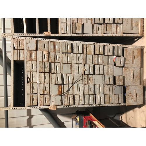 310 - Racking full of motorcycle and car spares. Including a large quantity of BSA and Triumph parts. Appr... 