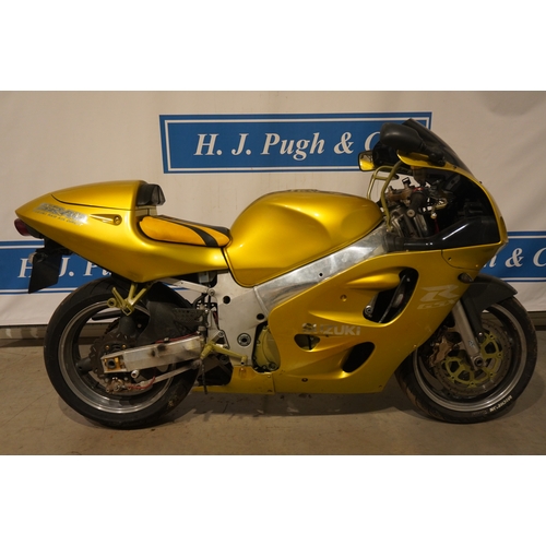 395 - Suzuki GSXR 600 motorcycle. 1997. c/w carb synchronizer and spare seat. No docs