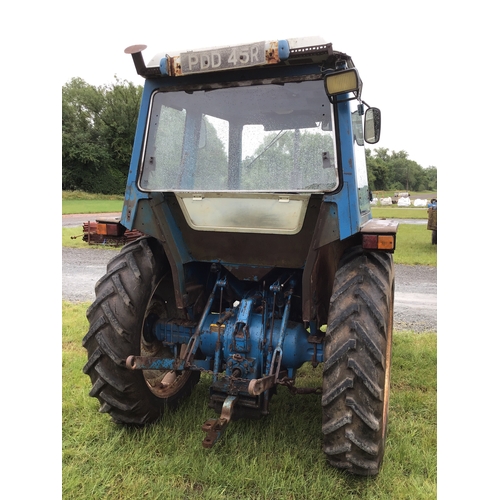 235 - Ford 4600 tractor c/w cab. Good original body work. Runs