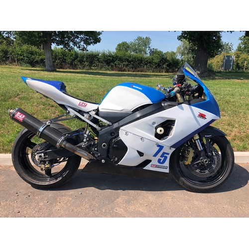 409 - Suzuki GSXR 750 race motorcycle.
Starts and runs. No docs c/w new forks