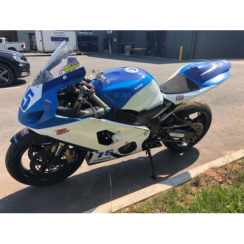 409 - Suzuki GSXR 750 race motorcycle.
Starts and runs. No docs c/w new forks