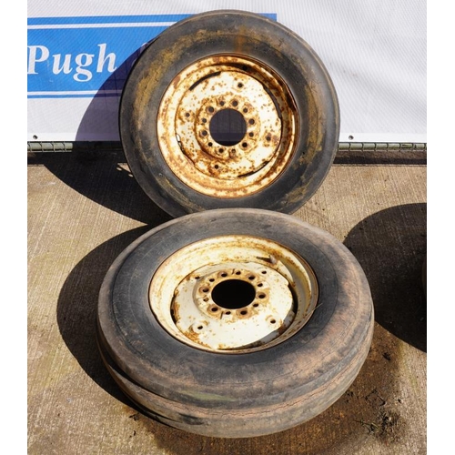 126 - Pair of front tractor wheels and tyres