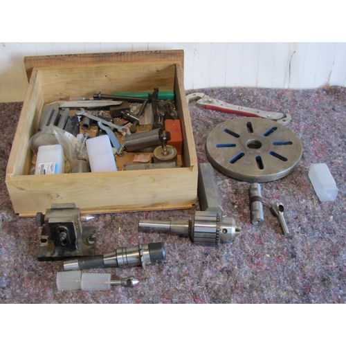 425 - Box of assorted lathe accessories including chuck, milling bits, base plate etc