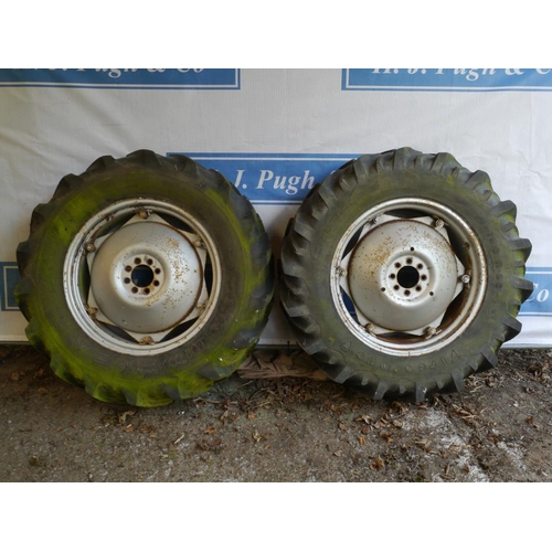 77 - Pair of Massey Ferguson wheel and Firestone tyres 13.6 R28