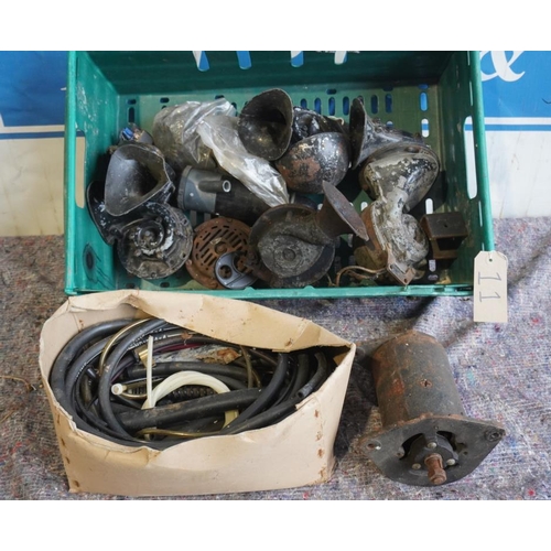 11 - Box of assorted car horns, starter motor etc