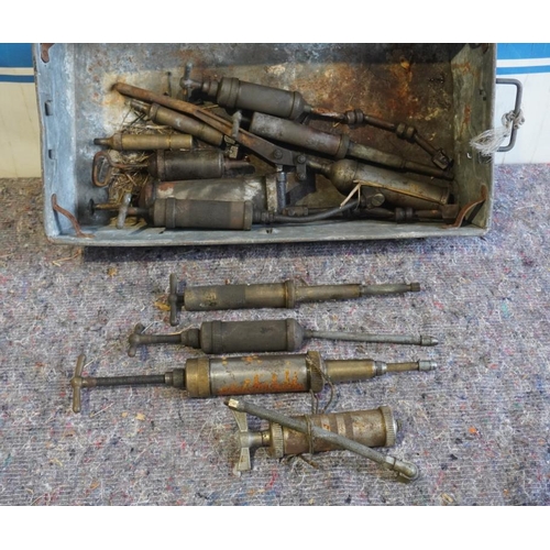 19 - Box of assorted old grease guns