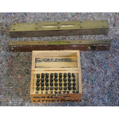 61 - 2 Vintage spirit levels, Rabone and Buck and Hickman and complete set of letter punches