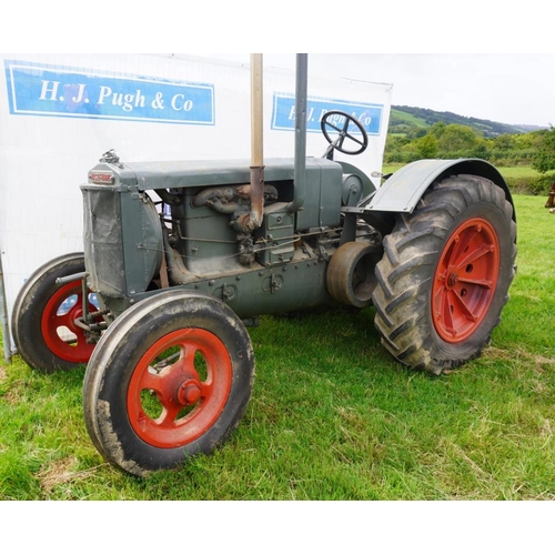 128 - Massey Harris 12/20 tractor. 1931. Petrol paraffin. suppliers plate- F Randall Ltd, North Walsham.