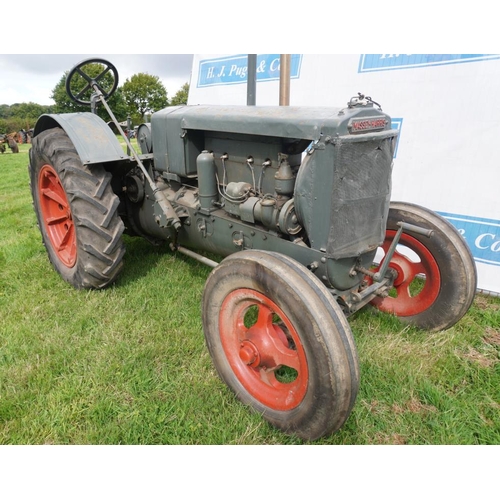 128 - Massey Harris 12/20 tractor. 1931. Petrol paraffin. suppliers plate- F Randall Ltd, North Walsham.