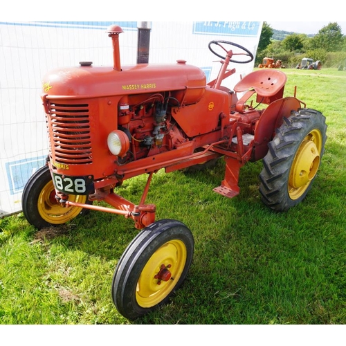 134 - Massey Harris Pony tractor. Rear wheel weights. Reg. ASJ 828.   V5