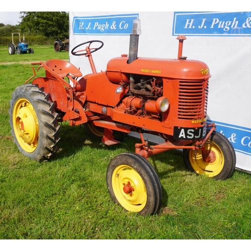 134 - Massey Harris Pony tractor. Rear wheel weights. Reg. ASJ 828.   V5