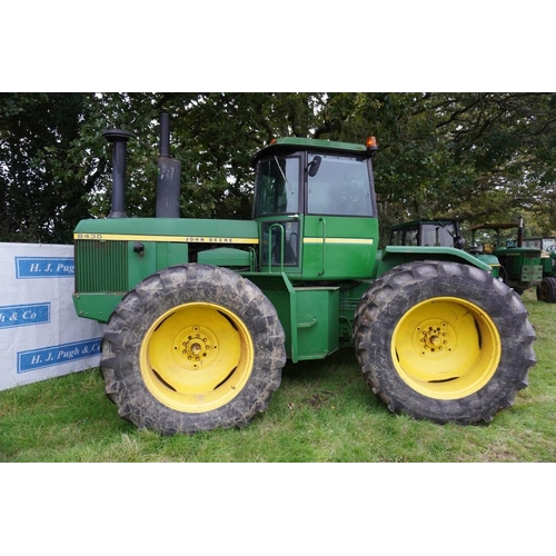 551 - John Deere 8430 articulated tractor. 6672hrs. Reverse gear needs attention